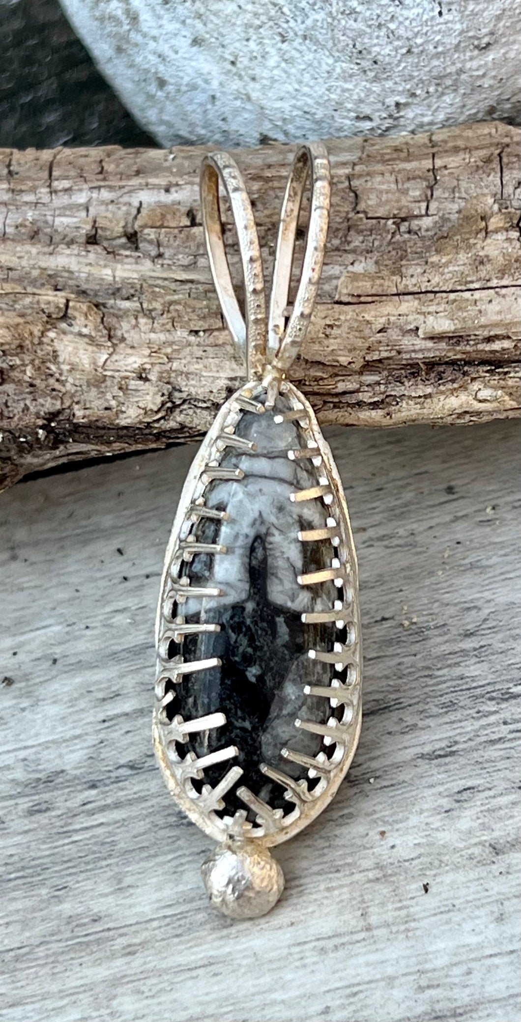 Fossil in sterling silver pendant
