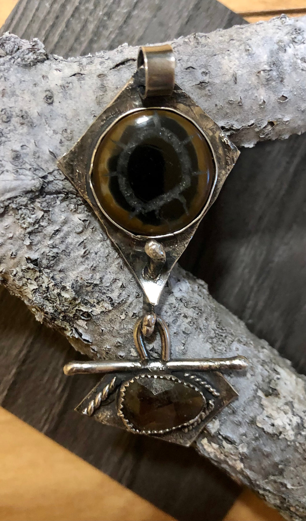Septarian and golden sapphire sterling silver pendant